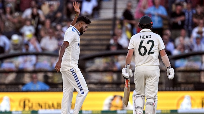 Mohammed Siraj and Travis Head
