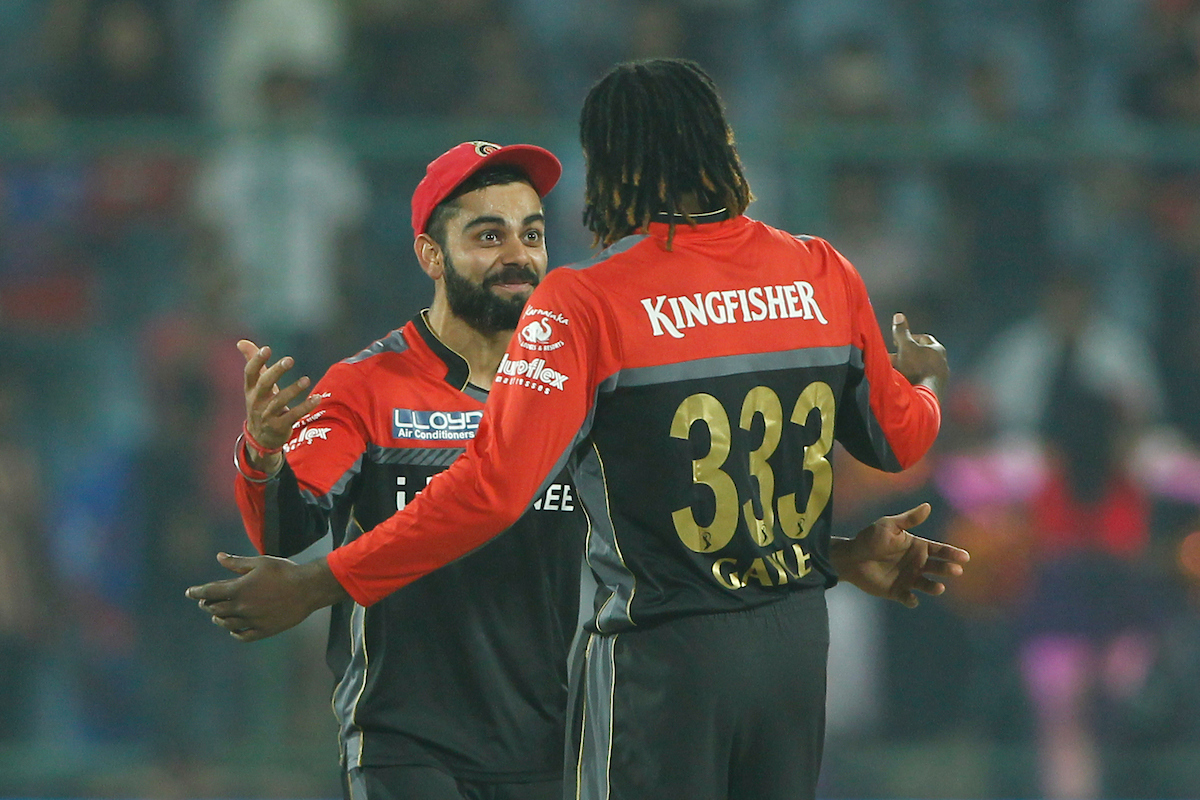 Virat Kohli with Chris Gayle