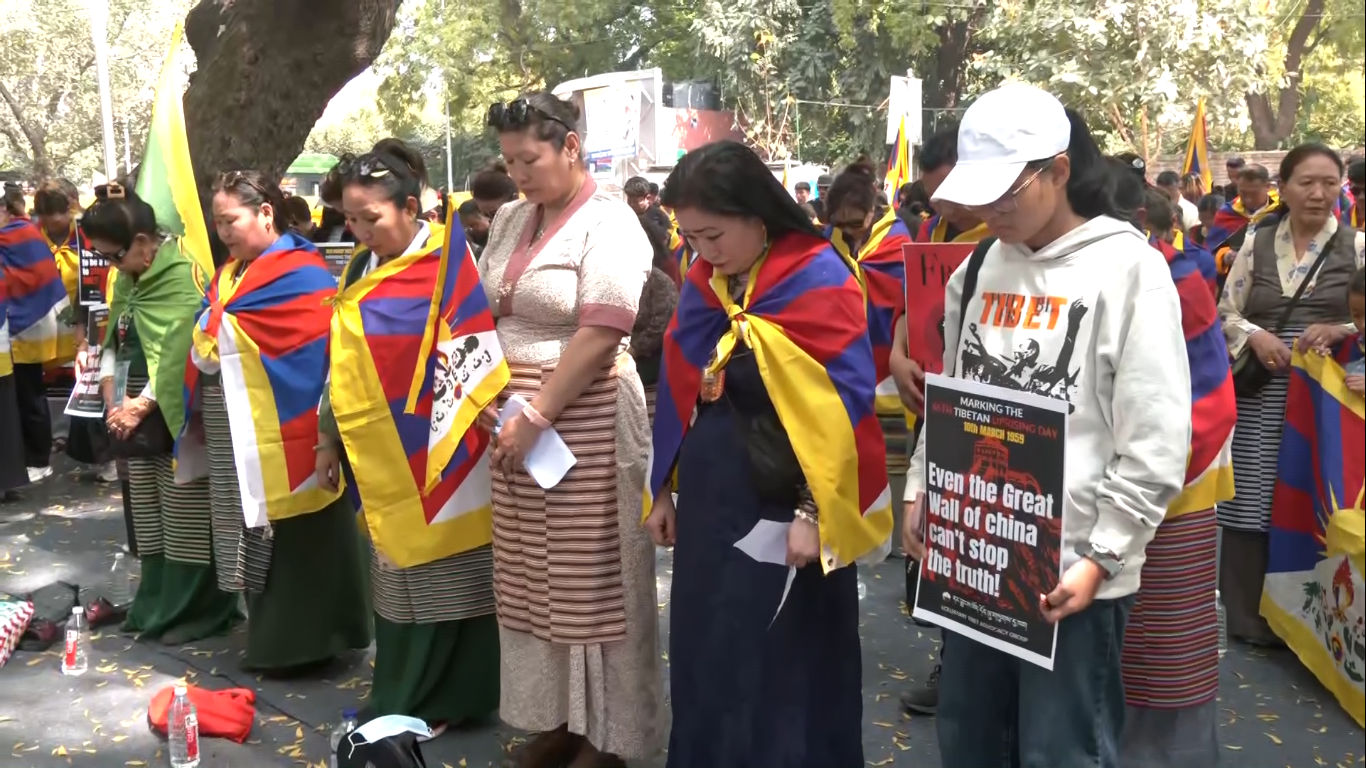 The protesters were seen holding Tibetan flags and placards demanding freedom of Tibet.
